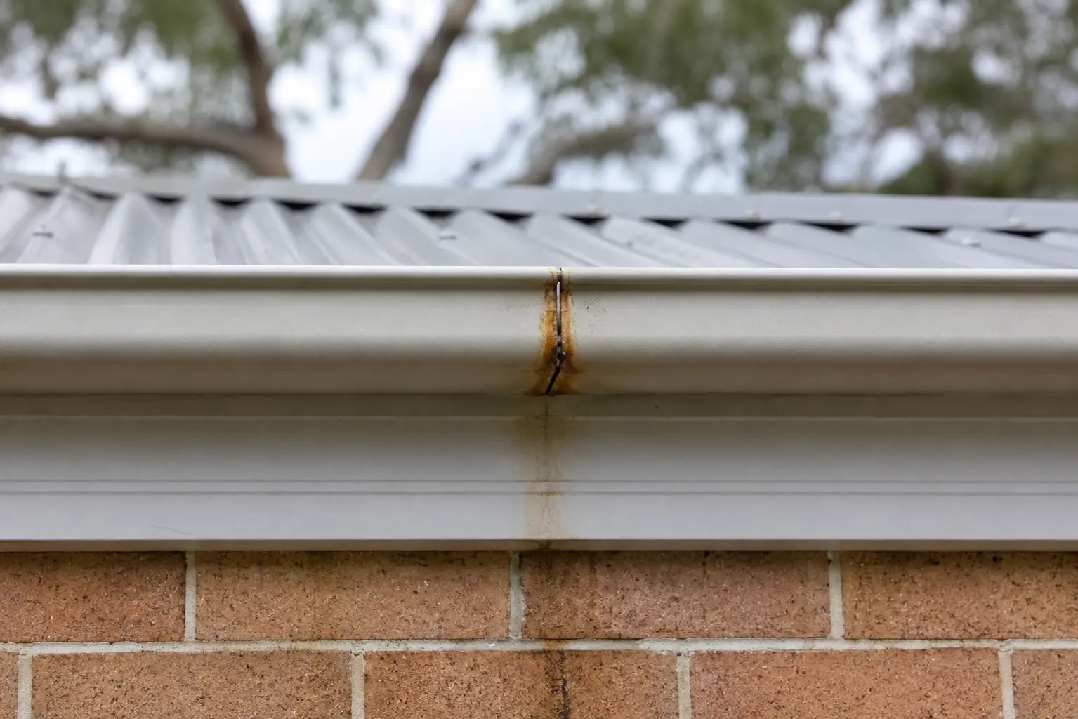 Resealed Gutter Section — before